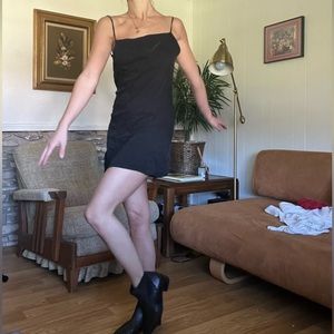 ZARA LITTLE BLACK DRESS WITH SMALL SLIT. Can be dressed up or down.